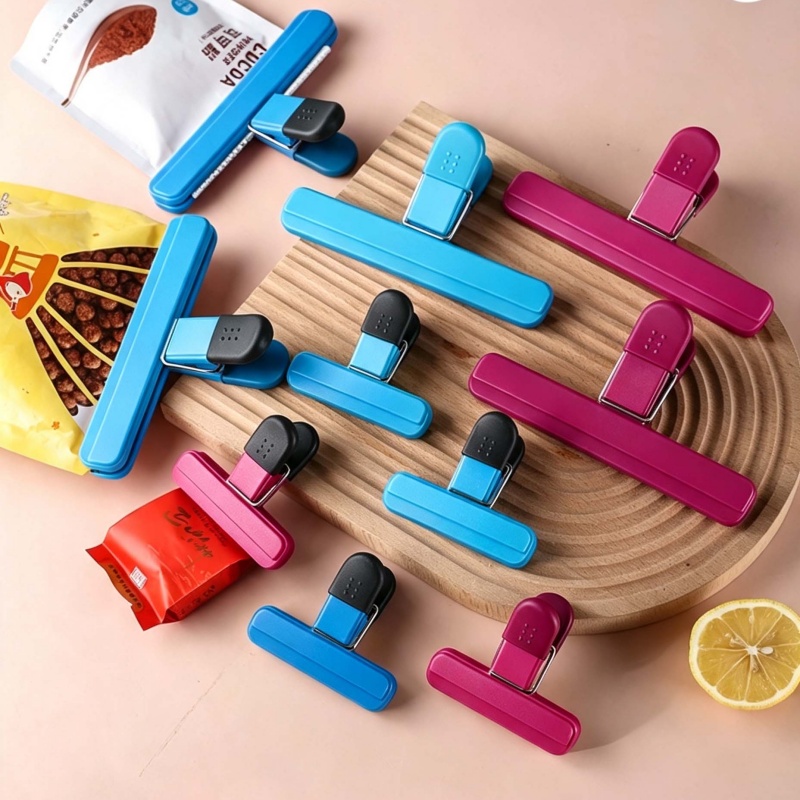 Kitchen Appliances Garage - คลิปหนีบปิดปากถุงพลาสติกแบบพกพา 4 ชิ้น, ที่หนีบปิดปากถุงอาหารและขนม, อุปกรณ์ปิดผนึกอเนกประสงค์สำหรับอุปกรณ์จัดเก็บในครัว